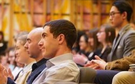 Audience members at the Welcome Event