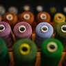 Spools of brightly-coloured thread