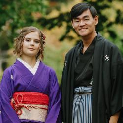 Andrew Fischer and his wife in kimono bearing the crest of House Hosokawa