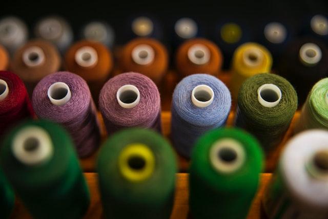 Spools of brightly-coloured thread