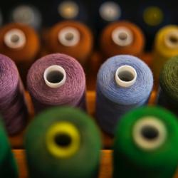 Spools of brightly-coloured thread